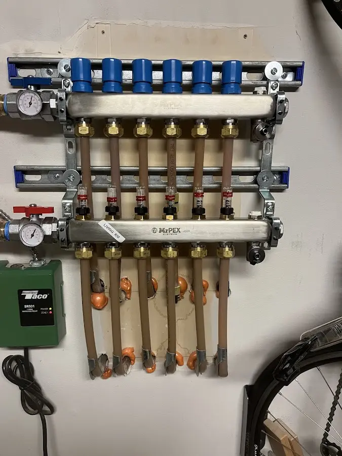 Plumber performing Leak Detection at a residential property in Yorkville